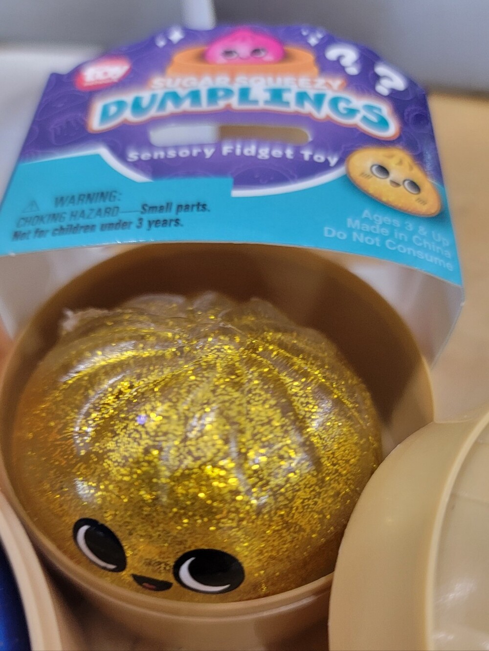 RARE Mini Gold Glitter Dumpling Toy in Tan Case